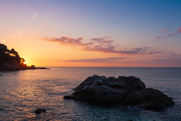 Fototapeta na wymiar Sea landscape. Sunrise on sea beach in Costa Brava
