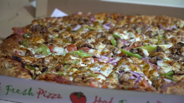 Fresh pizza delivery in pizza box, combo extra large