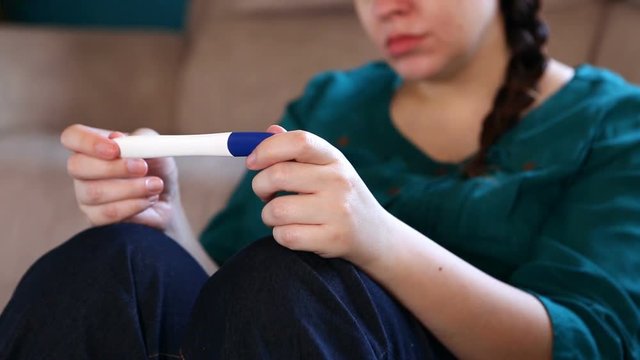 Excited Woman Gets Positive Pregnancy Test Result