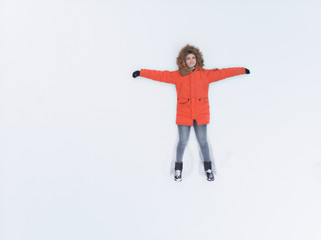 The girl in the snow - top view