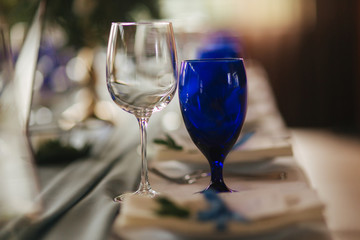 Elements of wedding decoration in restaurant. Green and blue color