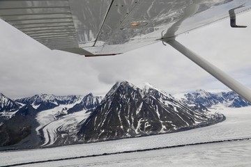 airplane over glaciers