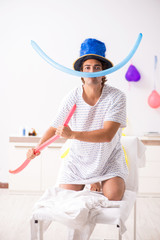 Young man celebrating his birthday in hospital