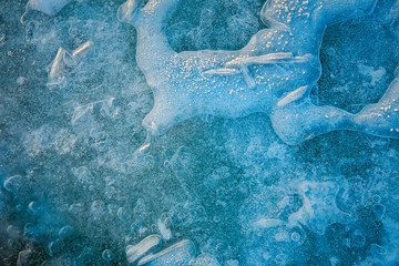 Fototapeta na wymiar Texture of ice blue surface. Beautiful background