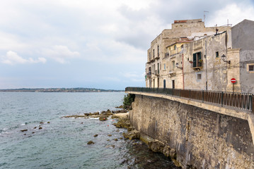 Waterfront of Ortygia Island with small pebble beach