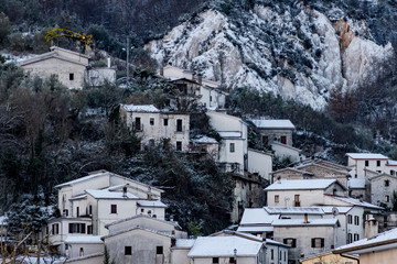 Fototapeta na wymiar Italian mountain village of Villa Latina in cold snowy landscape
