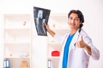 Young male doctor radiologist working at the clinic