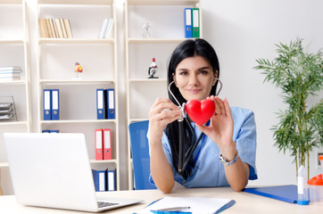 Female doctor cardiologist working in the clinic