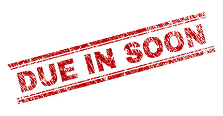 DUE IN SOON seal imprint with corroded texture. Red vector rubber print of DUE IN SOON text with unclean texture. Text title is placed between double parallel lines.