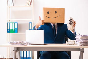 Happy man employee with box instead of his head