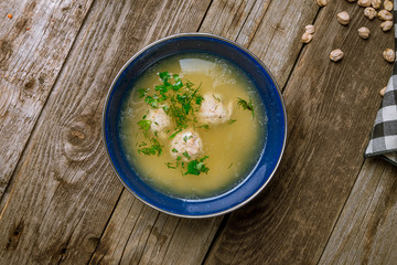 Chicken soup bouillon in a plate