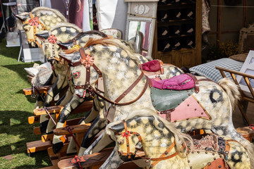 Row of vintage rocking horses