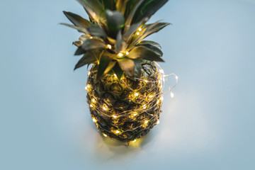 Fresh pineapple with Fairy lights