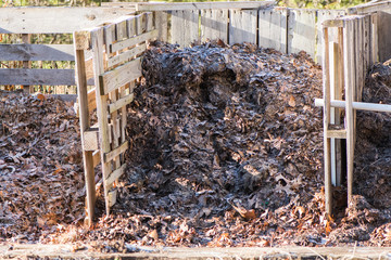Compost pile contained in wooden pallets