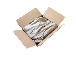 Opened cardboard postal delivery box with wrapping paper.