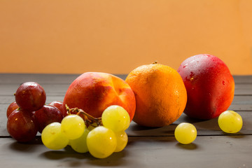 Group of fruits on a rustic background.