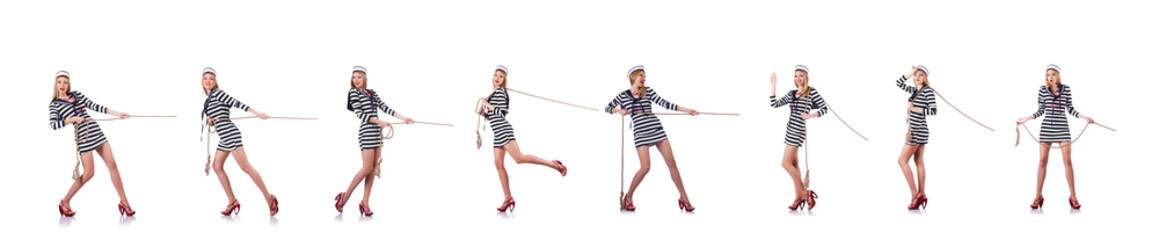 Woman sailor in tug of war concept
