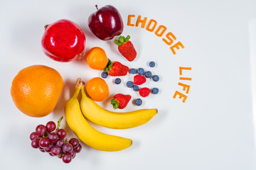 Organic Fruits on white table top with Choose Life message.