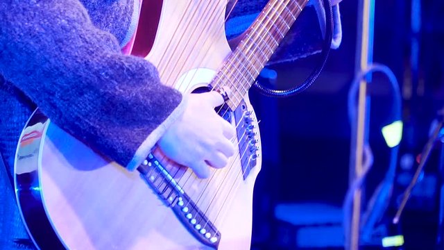 Musical instruments. Guitar with microphone