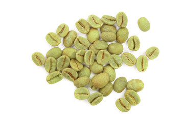 green coffee beans isolated on white background close up. Top view. Flat lay