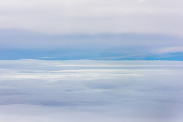 Naklejka na ściany i meble cloud and sky view from window of airplane
