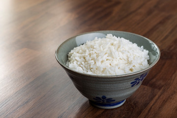 Cooked rice in vintage ceramic bowl