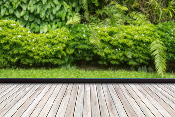 Wood flooring in a green plant garden decorative - 242076228