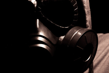 Gas mask on a black background.