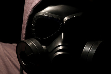 Fototapeta na wymiar Gas mask on a black background.
