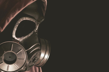 Gas mask on a black background.