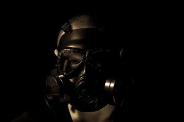 Gas mask on a black background.