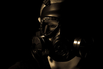 Gas mask on a black background.