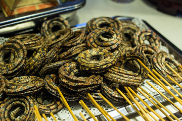 Thai insect feast / fried red chain snake
