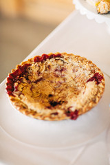 beautiful raspberry pie for dessert sitting on table