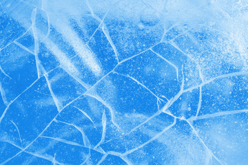 Abstract ice background. Blue background with cracks on the ice surface - 242088485