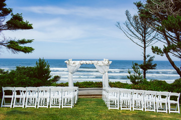 beautiful wedding ceremony site before and after wedding empty at beach coast