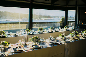 empty plates on table for a wedding during sunset