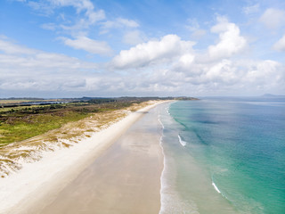A beautiful drone photo of Puheke beach in the Karikari peninsula, Far North of New Zealand