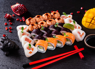 sushi on the black background