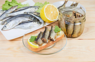 Open sandwich with preserved smoked sprats and ingredients