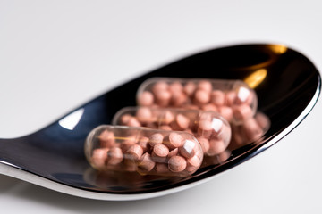 Tablets on a spoon