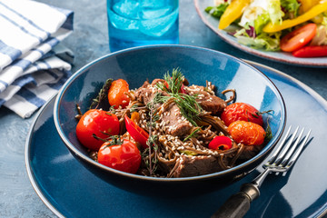 Soba noodles with beef, mushrooms, cherry tomato and sweet peppers