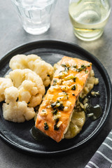 Solomon fillet with pineapple and cauliflower. Fish with vegetables.