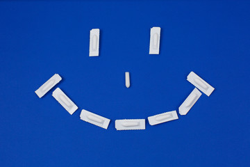 Medical Suppository, Rectal or Vaginal. Isolated on blue Background.