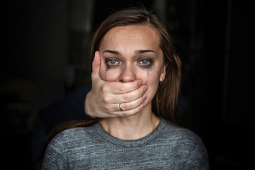 Portrait of a crying woman after beating by her husband. Female violence concept. Help for women suffering from domestic, woman violence. Social and life problems - obrazy, fototapety, plakaty