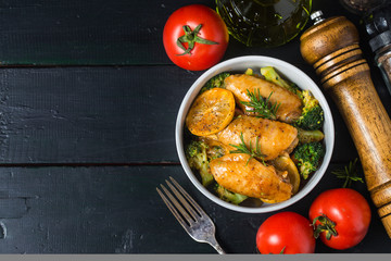 Grilled chicken wings with vegetables and herbs