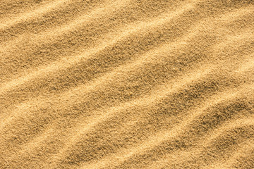 Fototapeta na wymiar Natural pattern of sand. Close up