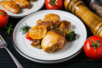 roasted chicken legs with vegetables and herbs