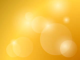 Abstract light background. Bokeh effect. Light on golden gradient. Vector illustration