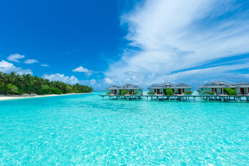 Maldives water bungalow on ocean water landscape